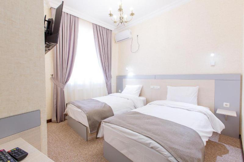 Navruz Hotel Taskent Habitación foto